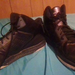 bland and white And1 shoes